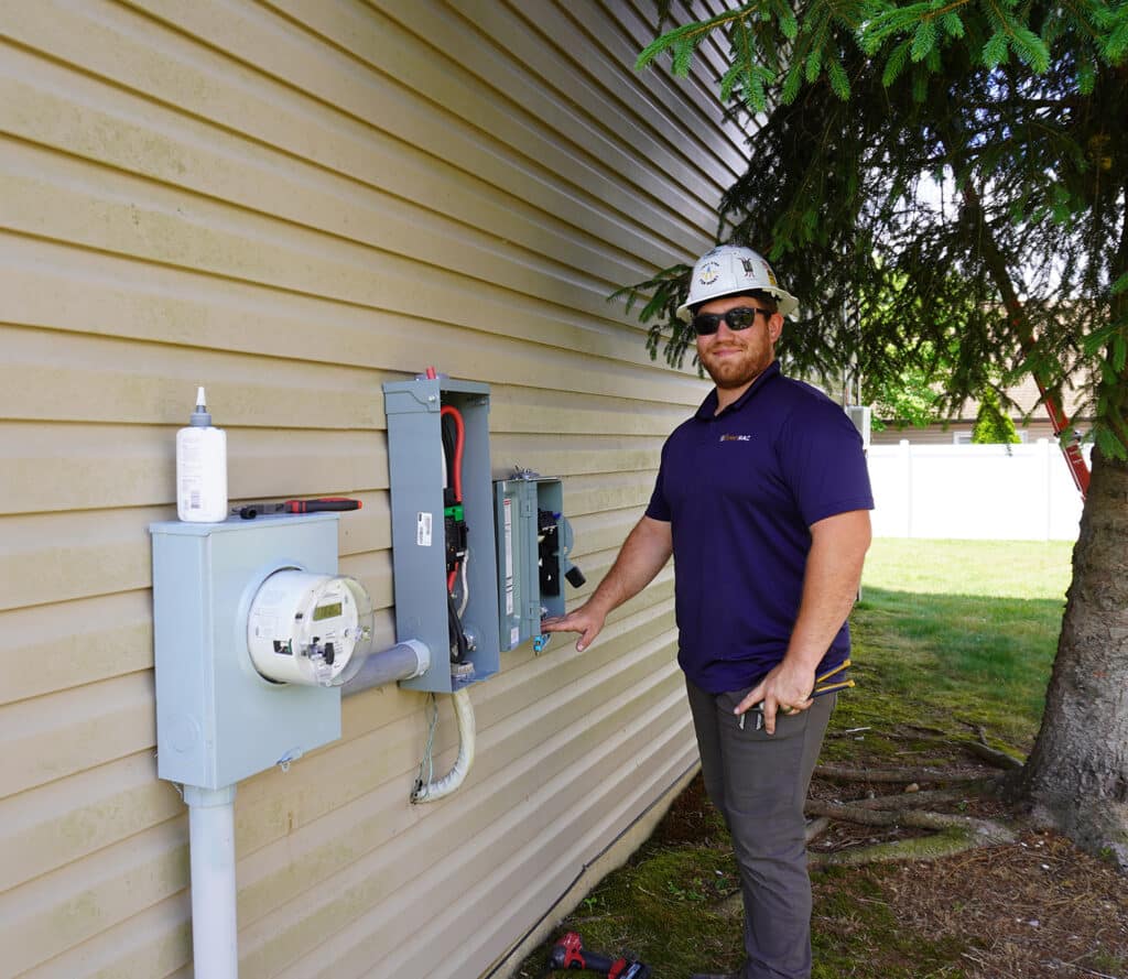 SunnyMac worker outside home